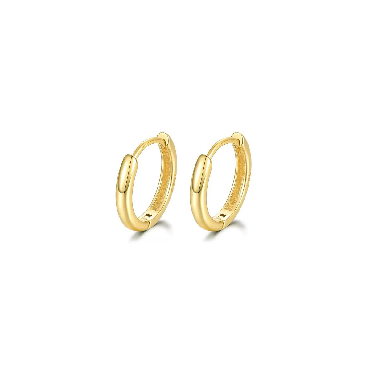 Gold hoop earrings on a white background