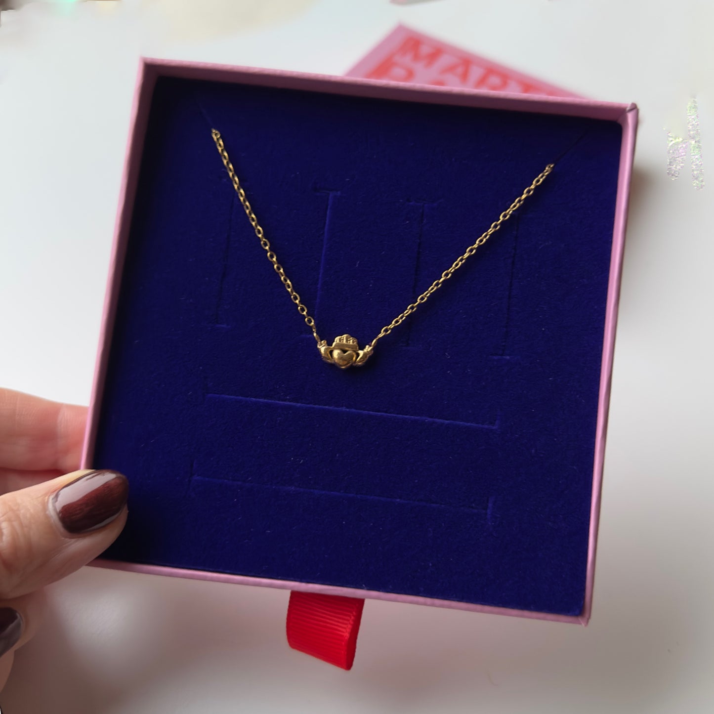 Gold claddagh necklace in martha parker jewellery gift box