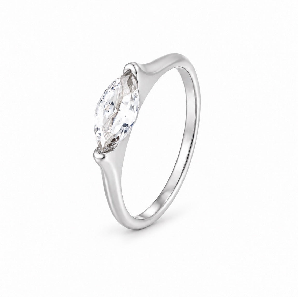 A silver ring featuring a marquise-cut clear gemstone in a prong setting, shown on a clean white background.