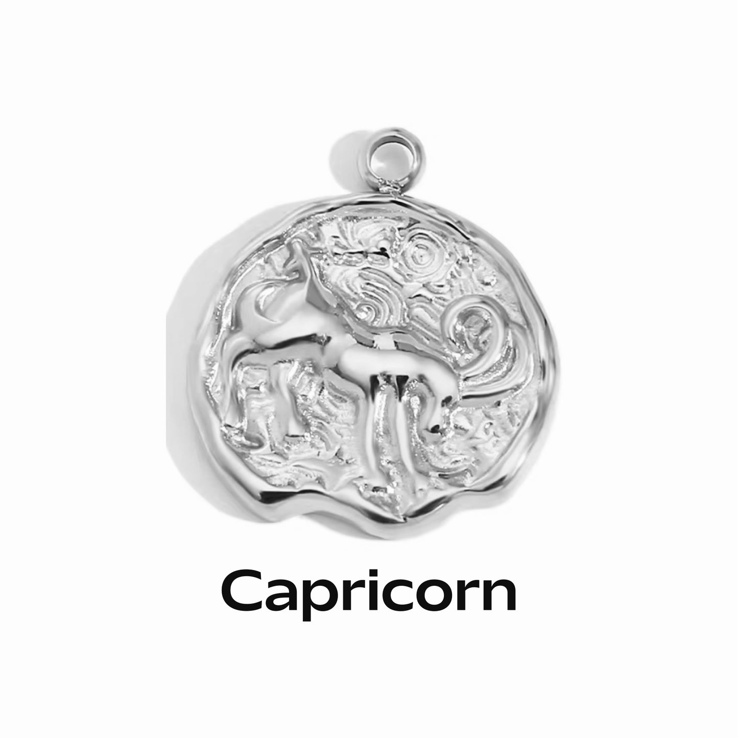 detail showing capricorn zodiac detail pendant