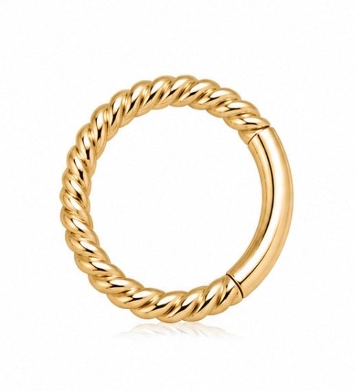 Gold twisted clicker hoop earring  on a white background
