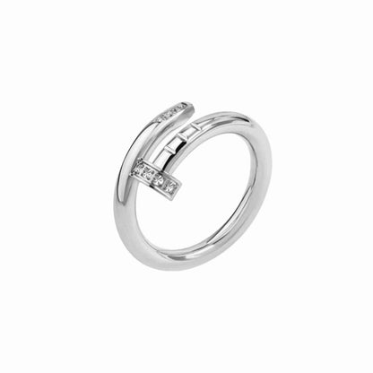 A silver nail ring with a cubic zirconia 