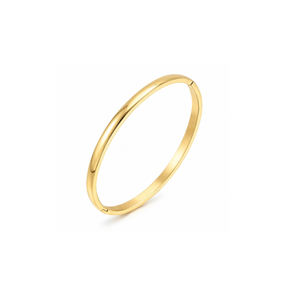 A polished yellow gold bangle bracelet shown at an angle on a clean white background.