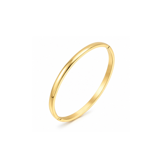A polished yellow gold bangle bracelet shown at an angle on a clean white background.