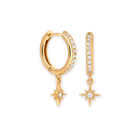 Gold hoop earrings with star charms on a white background