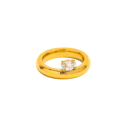 Gold ring with a oval cubic zirconia stone in a modern prong setting. waterproof and tarnish resistant 