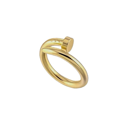 A gold-colored stainless steel nail ring 