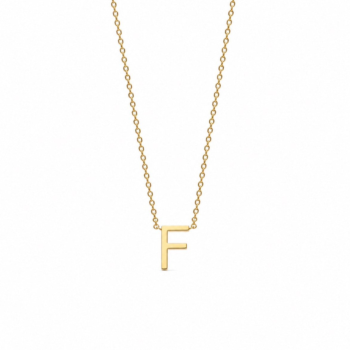 A delicate gold chain necklace featuring a polished capital letter 'F' pendant, shown against a solid white background.