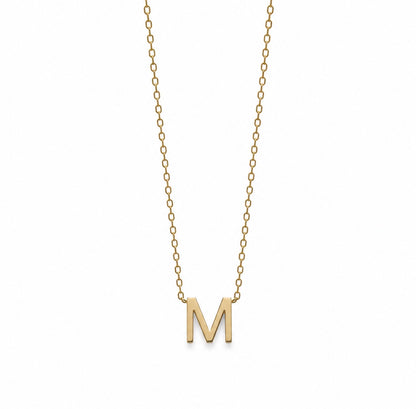 A delicate gold chain necklace featuring a polished gold capital letter 'M' pendant, shown against a plain white background.