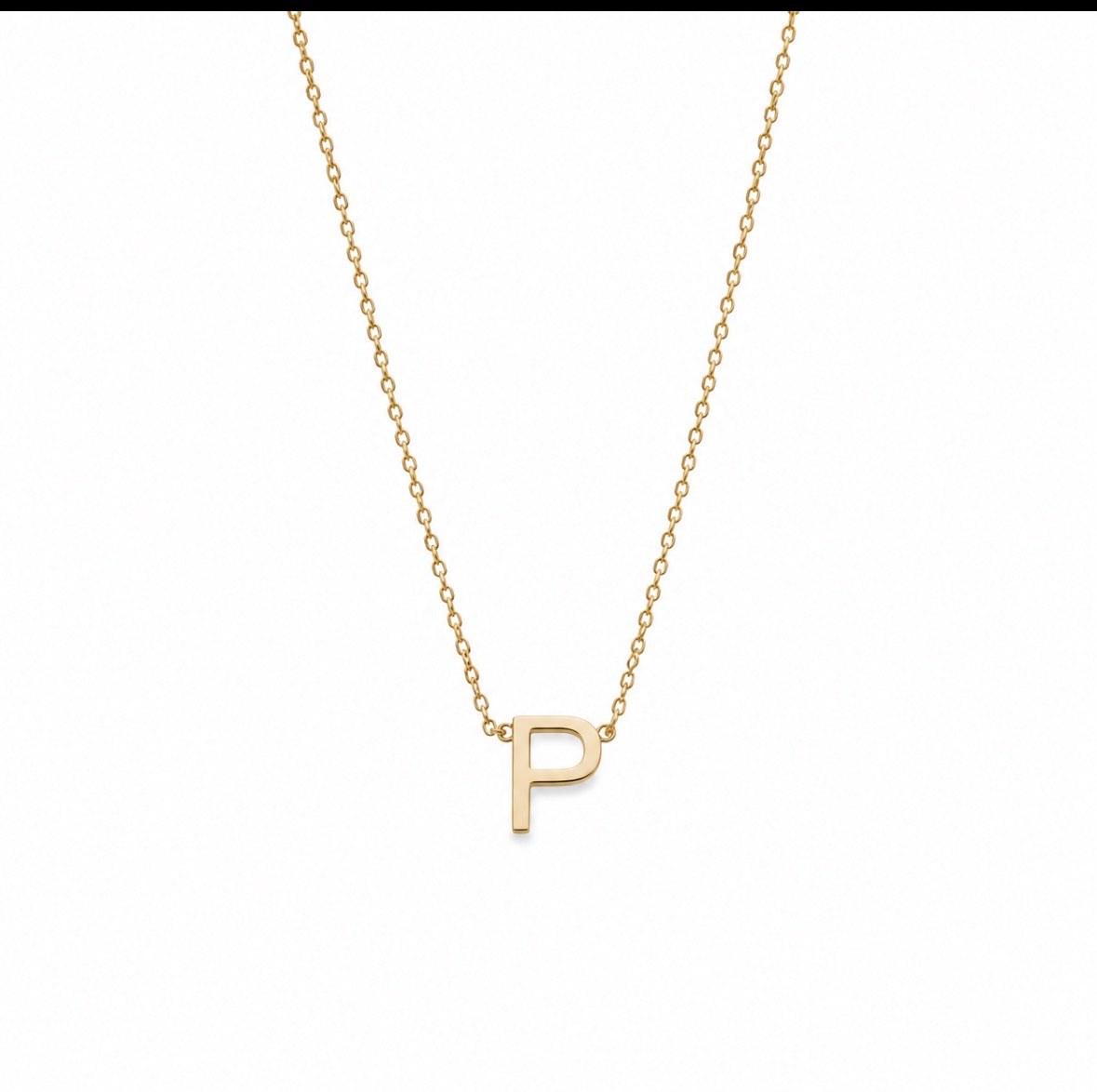 A delicate gold chain necklace featuring a small, polished gold initial pendant with the letter 'P', displayed against a solid white background.