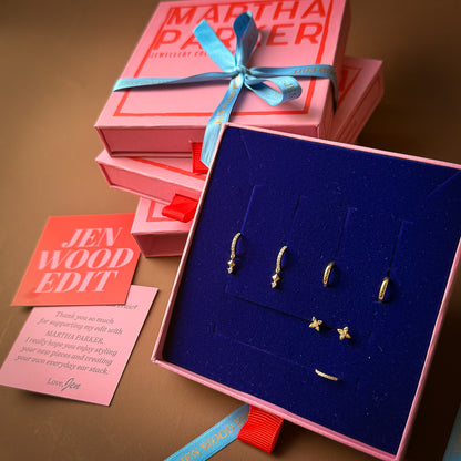 Jewelry set in a blue jewelry box with pink packaging and 'Martha Parker' branding.