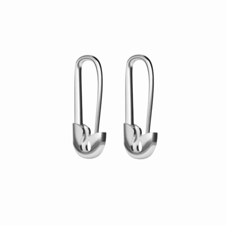 a pair Silver safety pin earrings on a white background