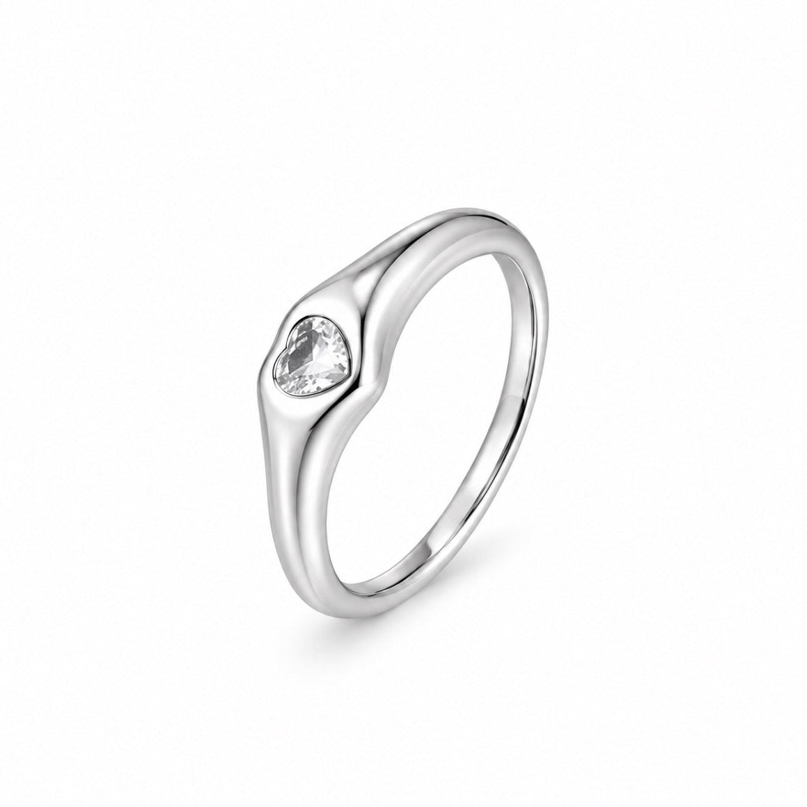 Silver ring with a diamond on a light gray background