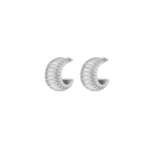 A pair of chunky silver crescent-shaped hoop earrings with a ribbed texture, shown on a plain white background.