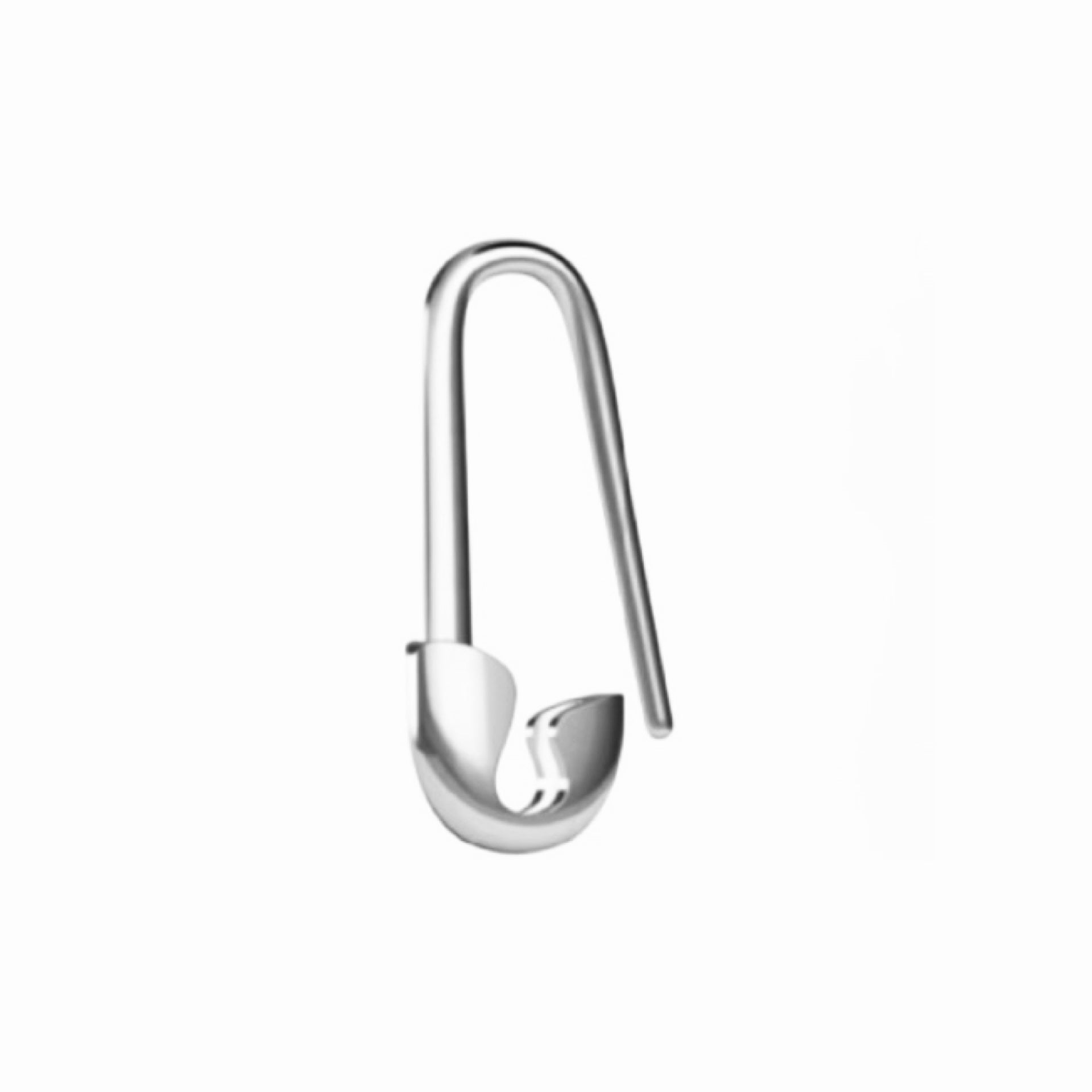Silver safety pin on a white background