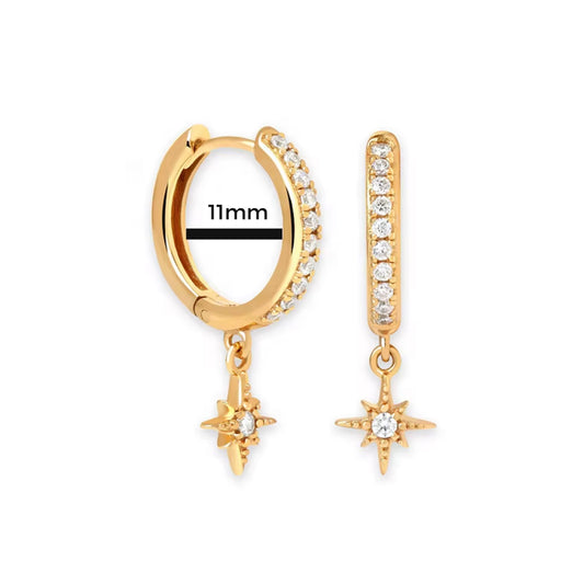 Gold hoop earrings with star-shaped charms on a white background