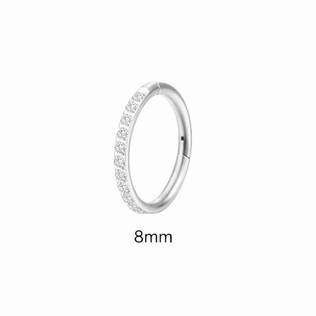Silver ring with small stones on a white background