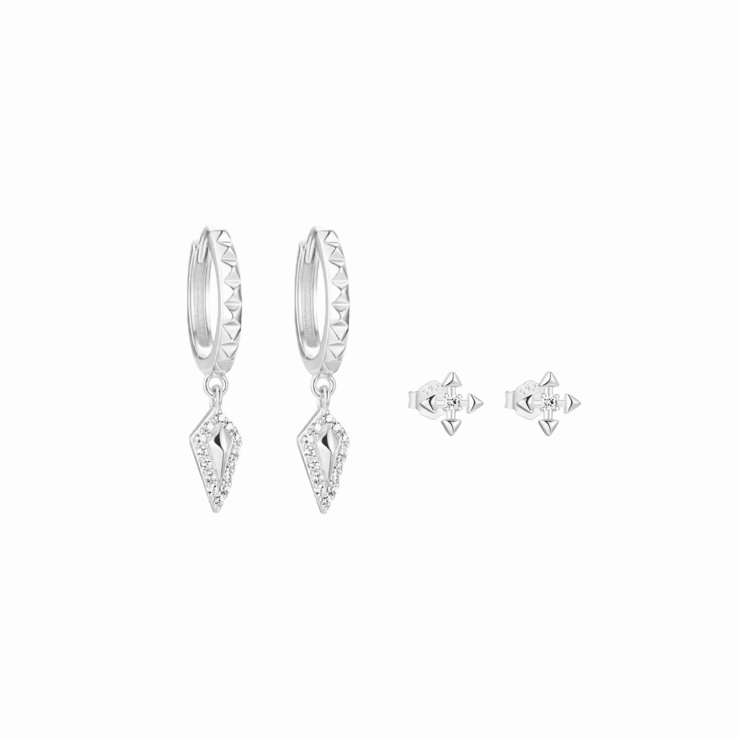 Silver hoop earrings with diamond-like stones on a white background