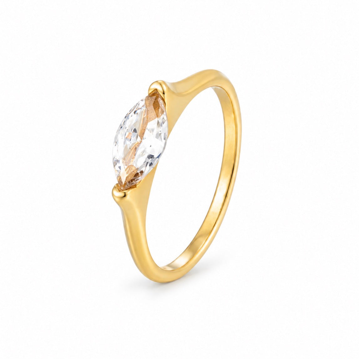 A gold ring featuring a marquise-cut clear gemstone in a prong setting, shown on a clean white background.