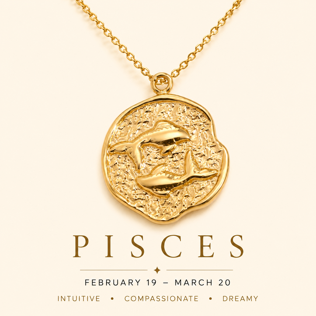 Gold Pisces zodiac pendant necklace on a beige background