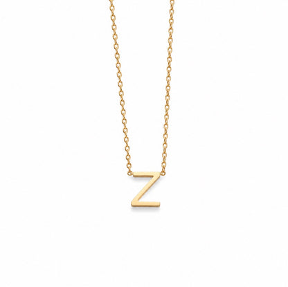 A delicate gold chain necklace featuring a polished, block-style capital letter 'Z' pendant, shown against a plain white background.