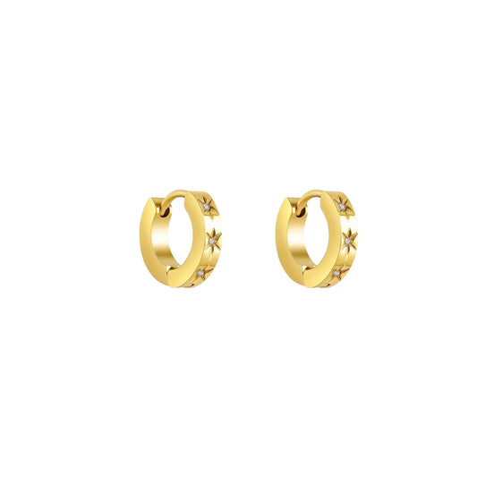 A pair of gold huggie hoop earrings with small star-shaped crystal accents, shown on a plain white background.