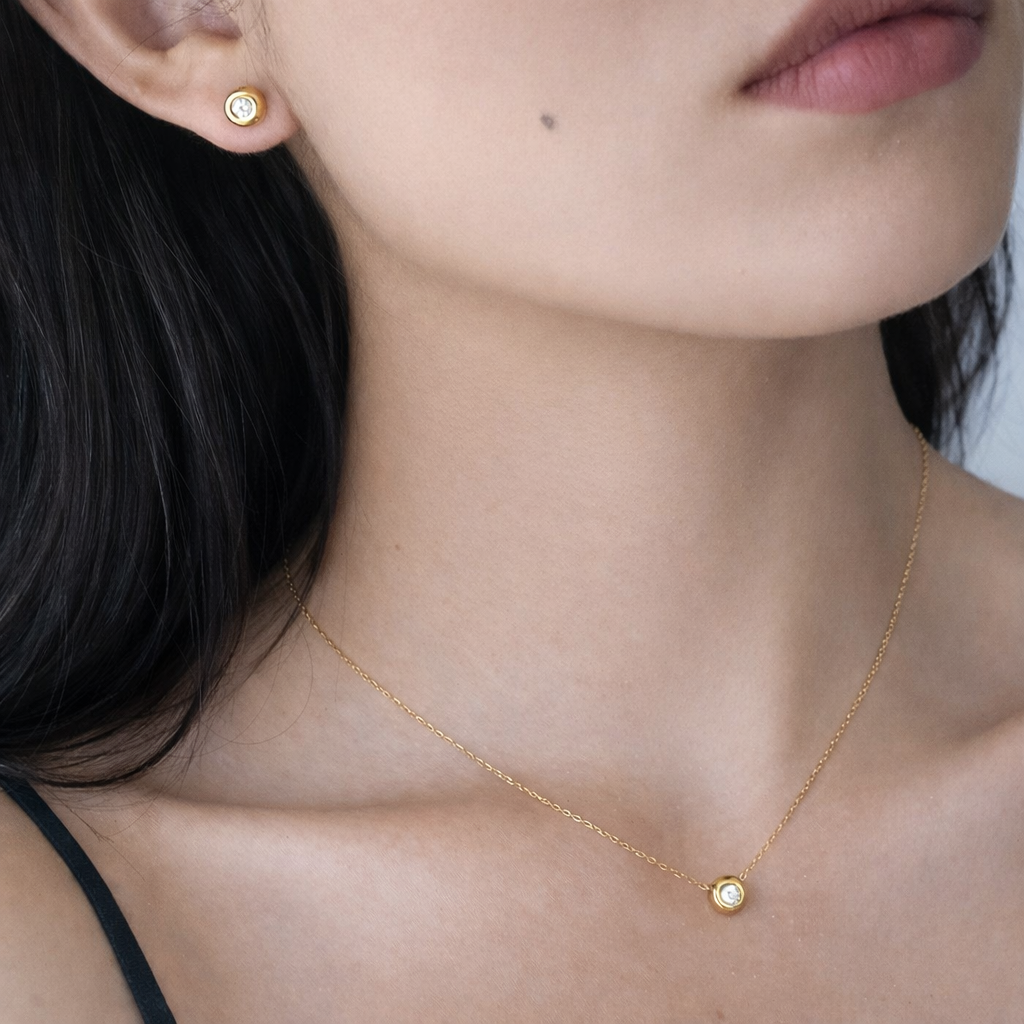 necklace and matching stud earring set shown worn on model 