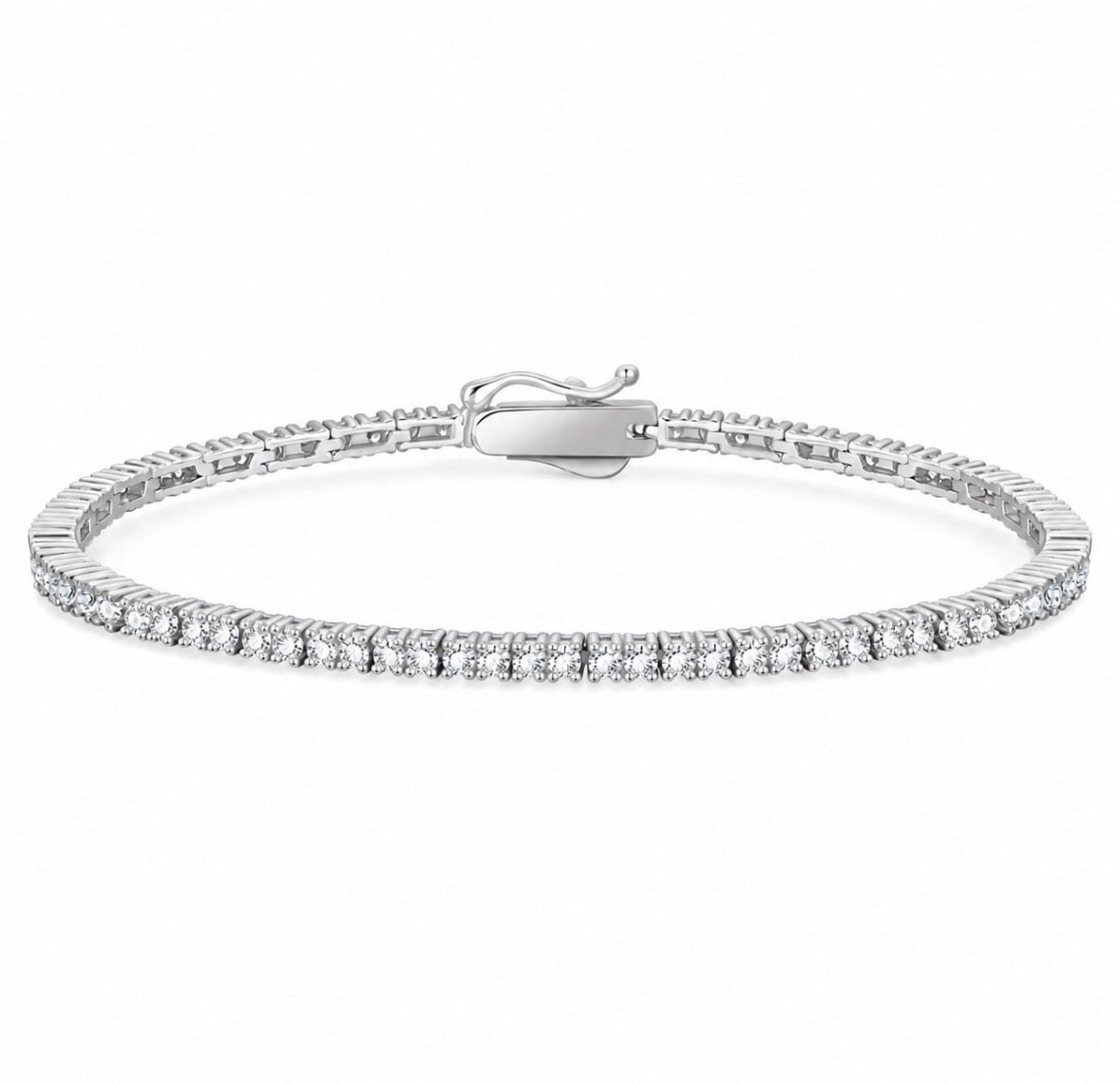A silver tennis bracelet with a row of clear round-cut stones and a lobster clasp, shown on a plain white background.