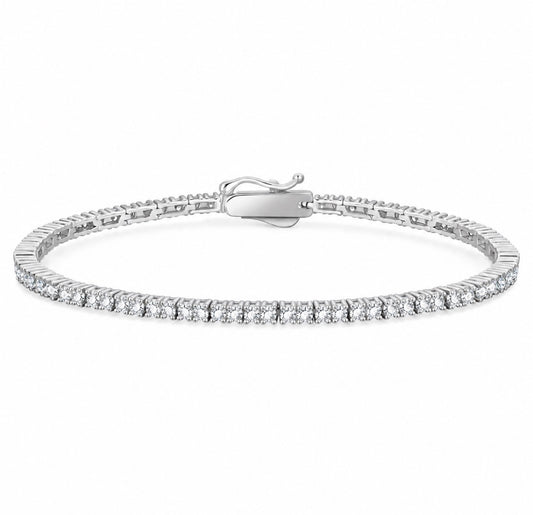 A silver tennis bracelet with a row of clear round-cut stones and a lobster clasp, shown on a plain white background.