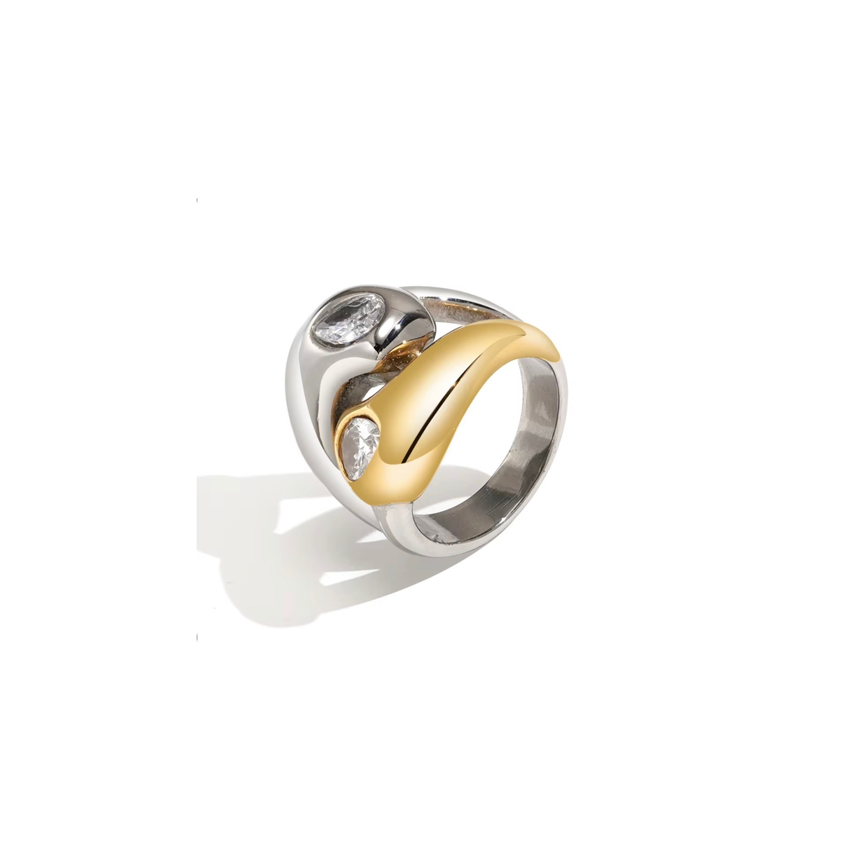A two-tone silver and gold ring with tow clear gemstones, shown on a plain white background with a soft shadow.